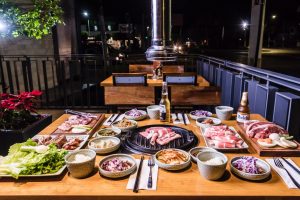 brown wooden table with foods