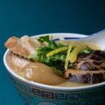 close up photo of a bowl with chinese porridge